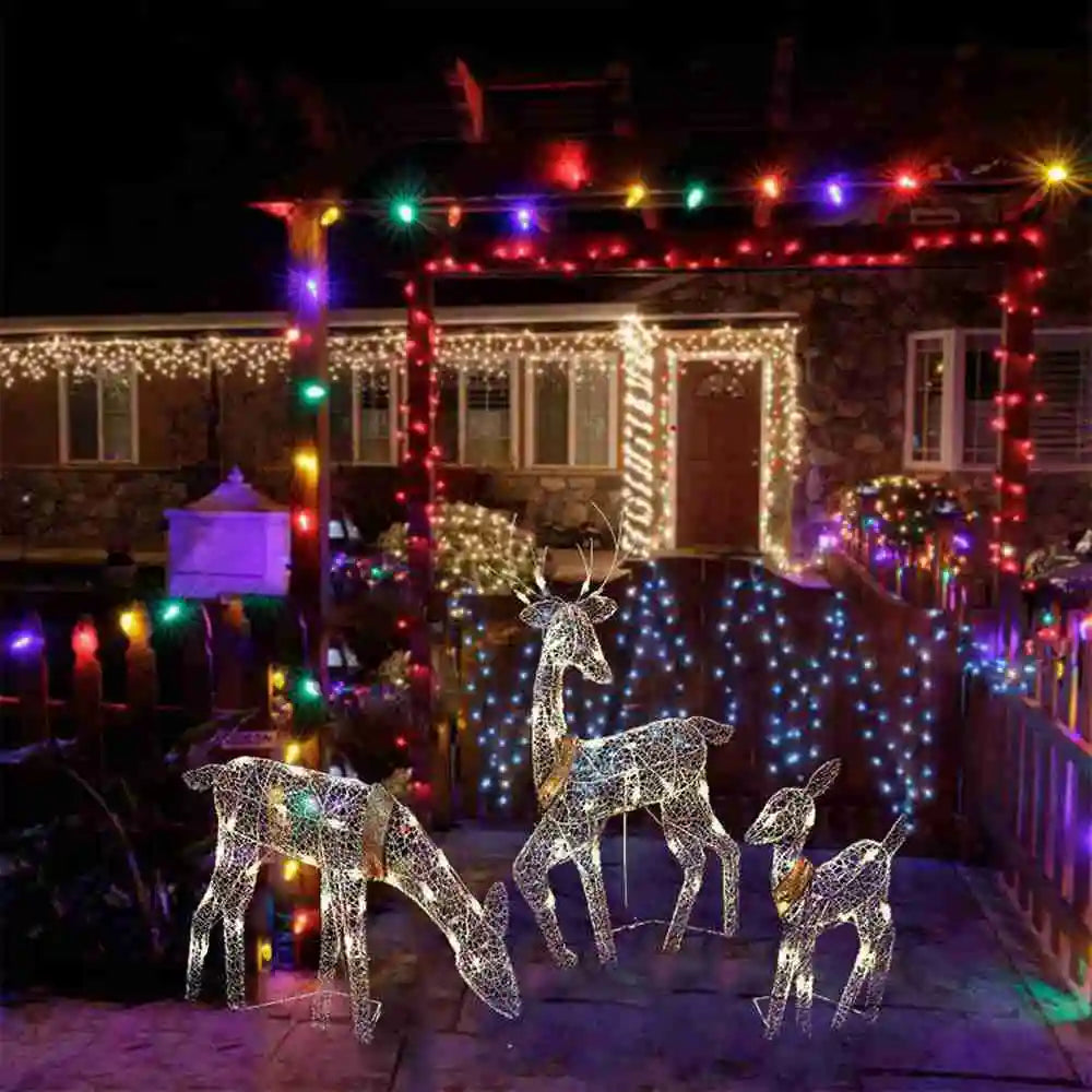Gloeiende ijzeren kunstwerk met eland en rendier als kerstversiering