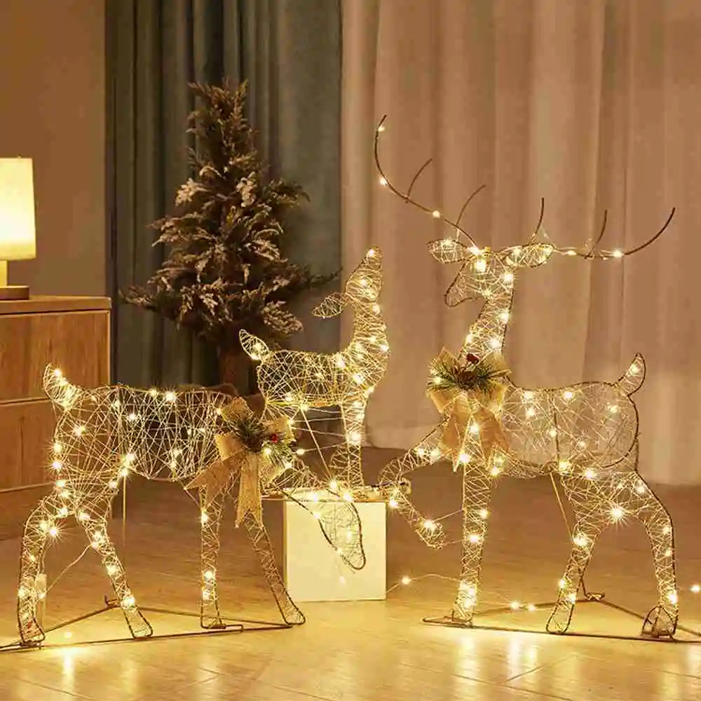 Gloeiende ijzeren kunstwerk met eland en rendier als kerstversiering